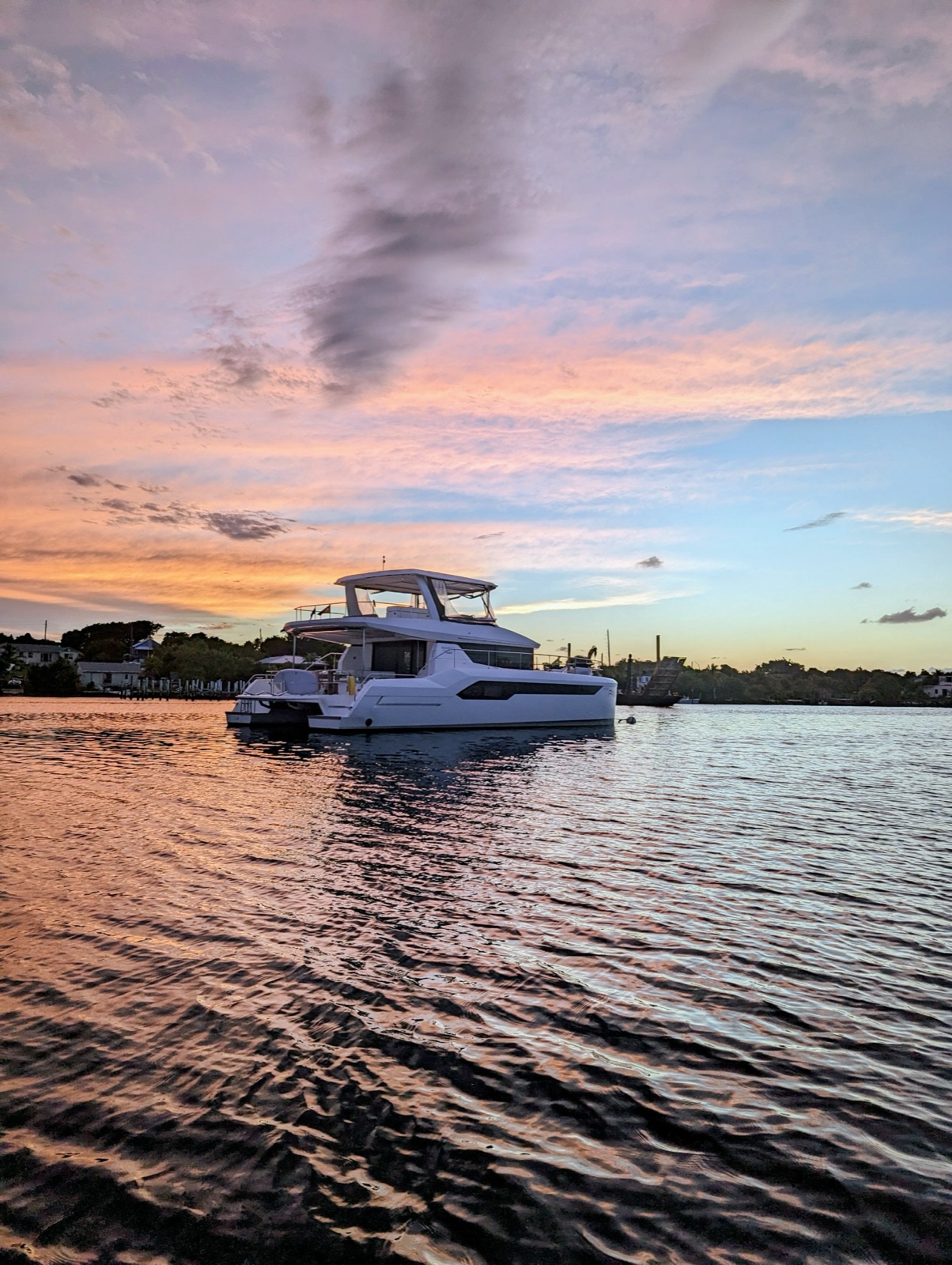 Leopard 55 Power Catamaran at anchor at sunset